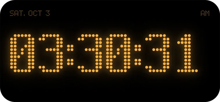 The Matrix Clock widget: 03:30:31 in amber dots, with Sat, Oct 3 and AM above.